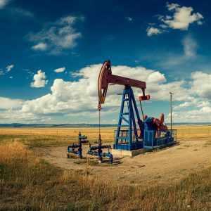 an AI generated image of an oil well that is still operating but reaching its limits.